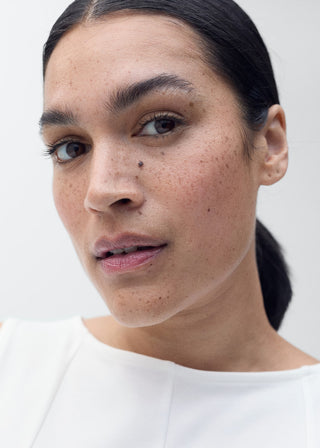 Blusa Peplum con Detalle en Costuras