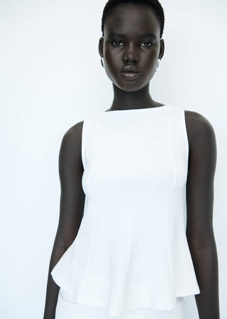 Blusa Peplum con Detalle en Costuras