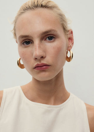 Blusa Denim Corte Peplum.