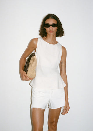 Blusa Denim Corte Peplum.