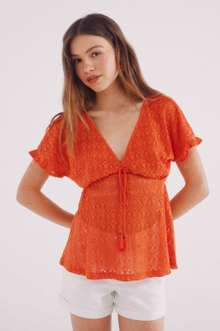 Blusa de Crochet con Borlas