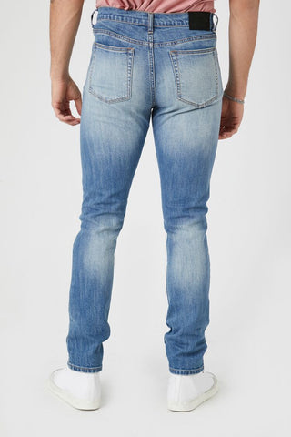 Jeans Ajustados con Efecto Desgastados