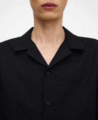Camisa.