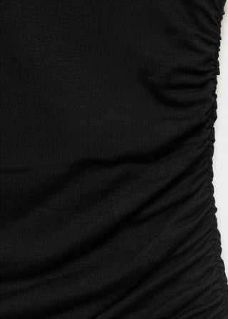 Blusa Escote Pico con Espalda Abierta.