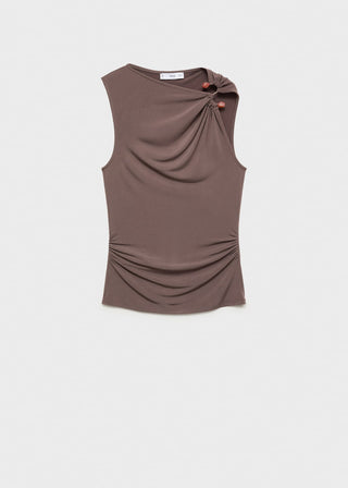 Blusa Fruncida con Detalles de Joyas.