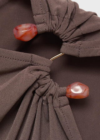Blusa Fruncida con Detalles de Joyas.