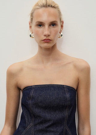 Blusa Denim con Detalle Peplum.