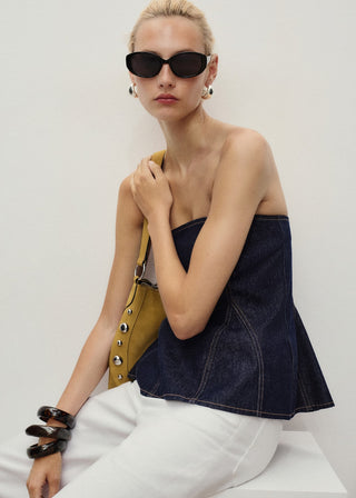 Blusa Denim con Detalle Peplum.