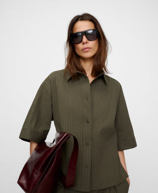 Camisa.
