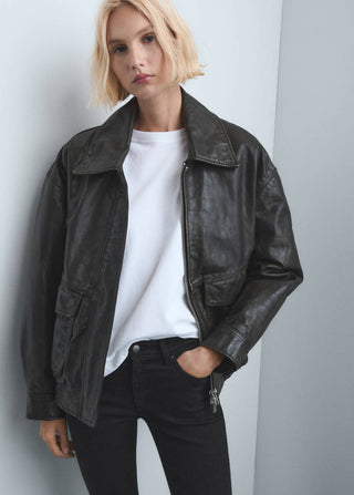 Jeans Ajustados Talle Alto con Bolsillos