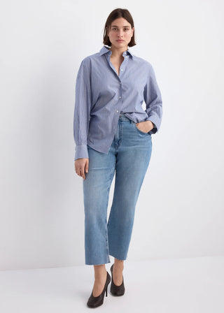 Jeans Cropped Acampanados con Bolsillos