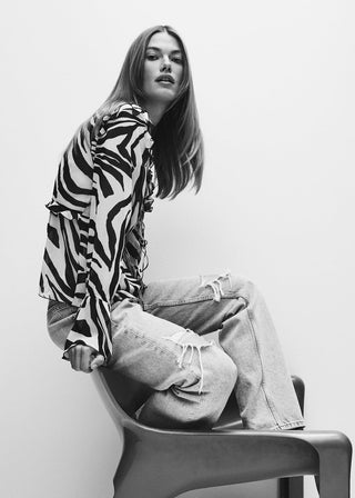 Blusa con Volantes Estampado Animal Print