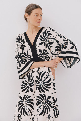 Vestido Manga Capa con Estampado Floral.