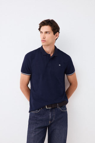 P1K Polo Puño Logo Hd.