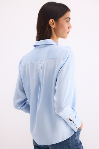 E. Camisa M/L Satinada Volante.