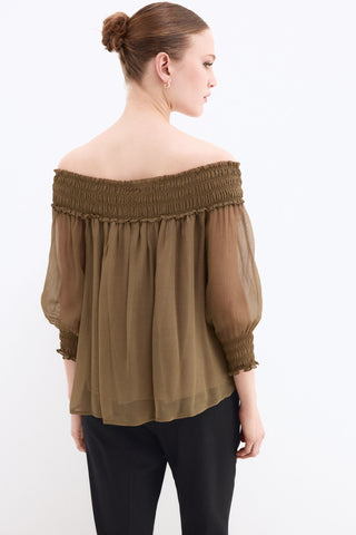 E. Blusa Off Shoulder Goma.
