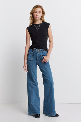 Sleeveless Padded Shoulder Tee.