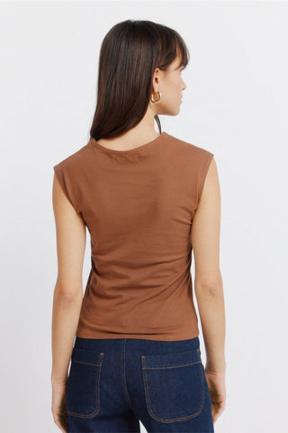 Sleeveless Padded Shoulder Tee.