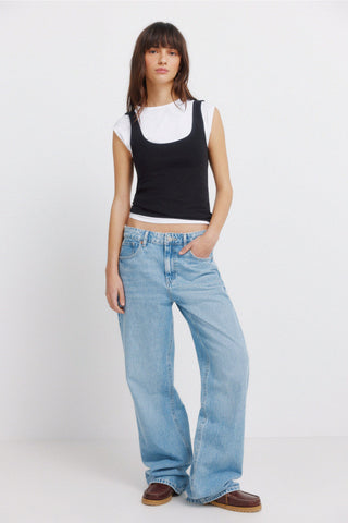 Sleeveless Padded Shoulder Tee.