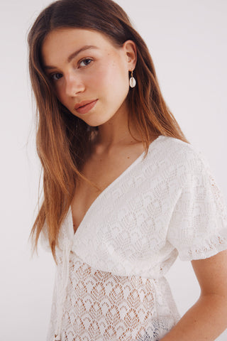 Blusa de Crochet con Borlas