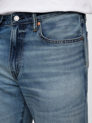 Jeans Slim Fit con Bolsillos
