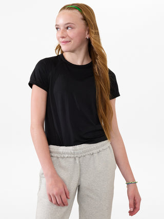 Camiseta larga deportiva Power Up para niña Athleta.