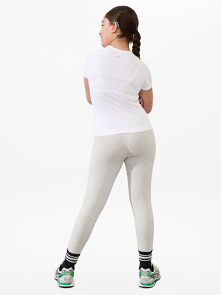 Camiseta larga deportiva Power Up para niña Athleta.
