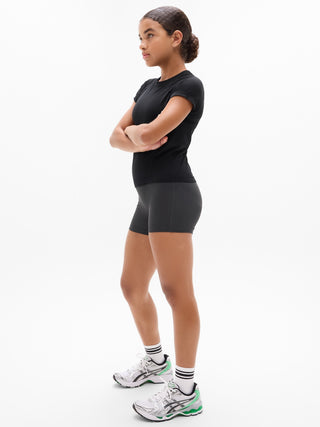 Camiseta larga deportiva Power Up para niña Athleta.