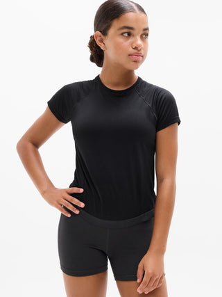 Camiseta larga deportiva Power Up para niña Athleta.