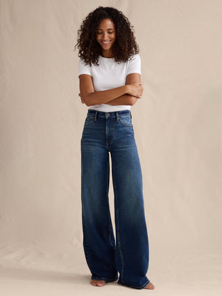 Jeans Acampanado Talle Alto con Bolsillos
