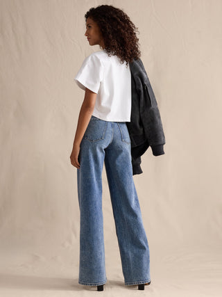 Jeans Acampanado Talle Alto con Bolsillos