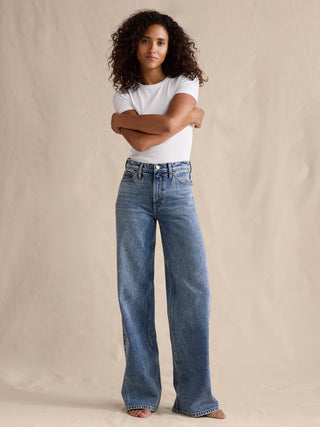 Jeans Acampanado Talle Alto con Bolsillos