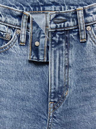 Jeans Acampanado Talle Alto con Bolsillos