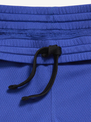 Shorts deportivos de malla para niños.