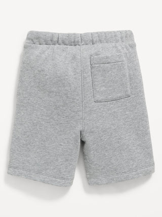 Shorts deportivos de polar con logo gráfico para niños pequeños.