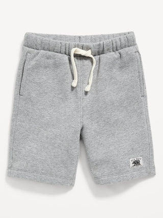 Shorts deportivos de polar con logo gráfico para niños pequeños.