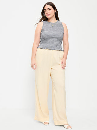Pantalones súper anchos en mezcla de lino y talle alto.