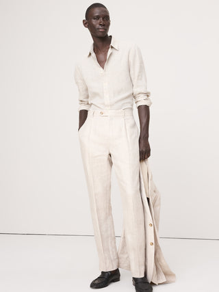 Pantalón de traje entallado de lino con diseño de espiguilla.