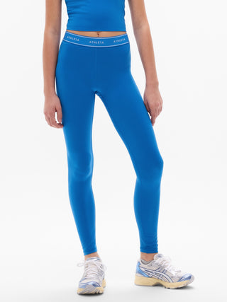 Legging de talle alto para niña Athleta con logo Chit Chat.