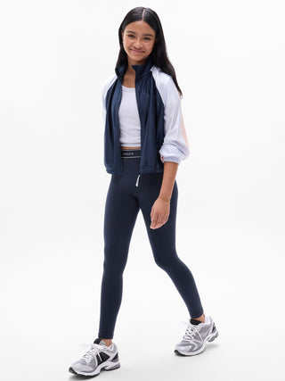 Legging de talle alto para niña Athleta con logo Chit Chat.
