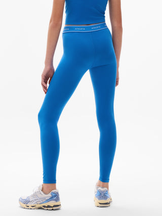 Legging de talle alto para niña Athleta con logo Chit Chat.