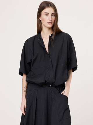 Top de algodón elástico con mangas abullonadas.