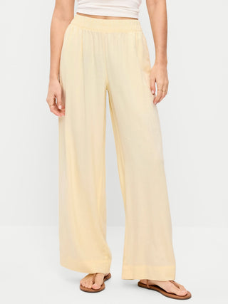 Pantalones súper anchos en mezcla de lino y talle alto.
