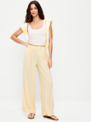 Pantalones súper anchos en mezcla de lino y talle alto.