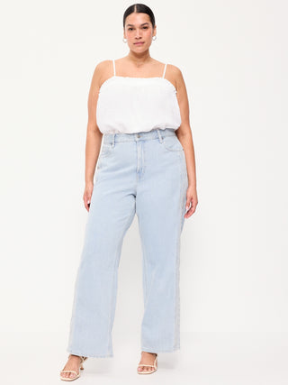 Jeans anchos bordados con cintura extra alta.