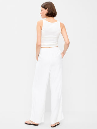 Pantalones anchos en mezcla de lino con talle alto.