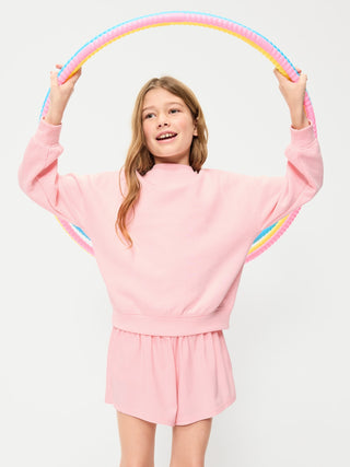 Shorts deportivos StretchTech de cintura alta para niñas.