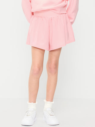 Shorts deportivos StretchTech de cintura alta para niñas.