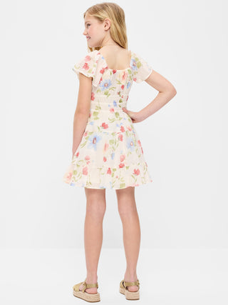 Vestido escalonado de gasa arrugada entallado y con vuelo para niñas.