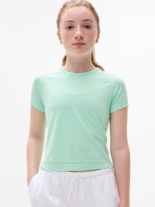 Camiseta larga deportiva Power Up para niña Athleta.